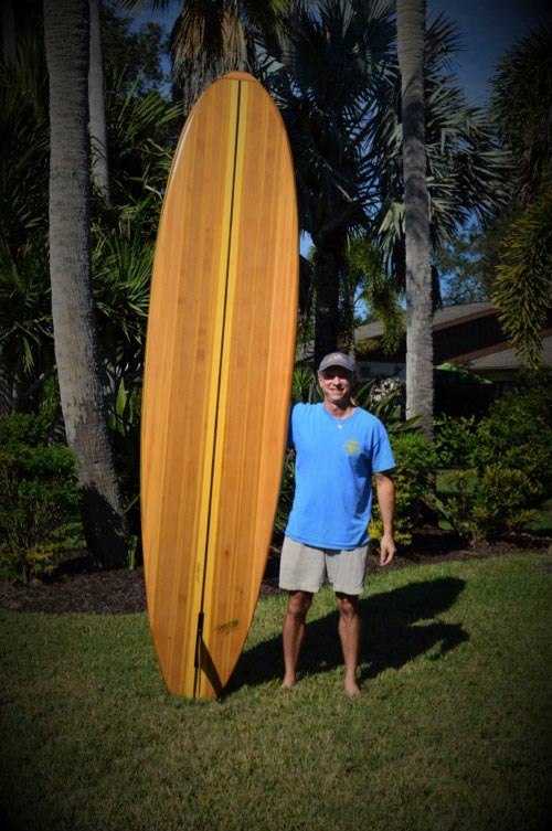 Ken Marvel with handmade paddleboard