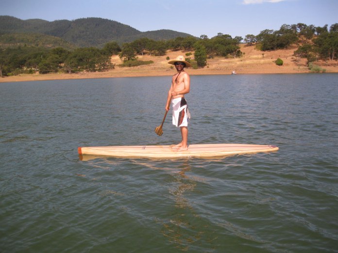 a Clearwood Paddleboard being used on a lake
